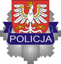 Na zdjęciu gwiazda policyjna z napisem POLICJA oraz godłem Polski w tle